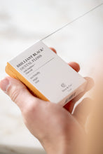 Load image into Gallery viewer, Brilliant Black® Floss – Whitens Between Teeth Naturally
